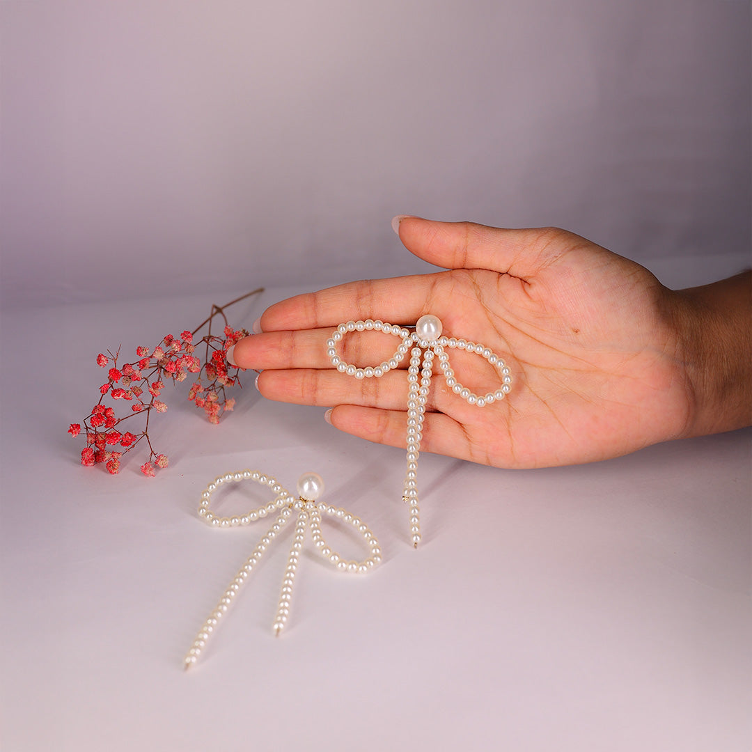 Twirling pearl Bows